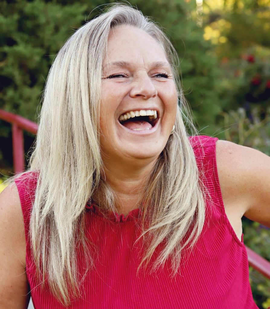 Alicia Unruh laughing outdoors